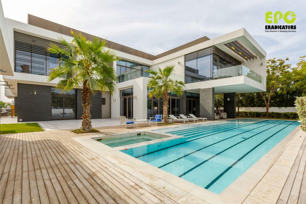 A beautiful modern villa in a Dubai community, representing a home protected from pests by Eradicators' services.